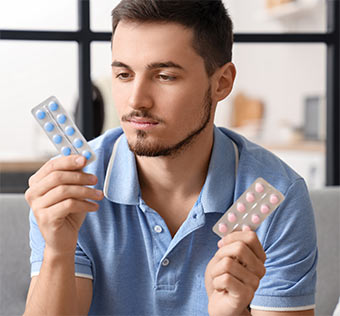 Man choosing medicine